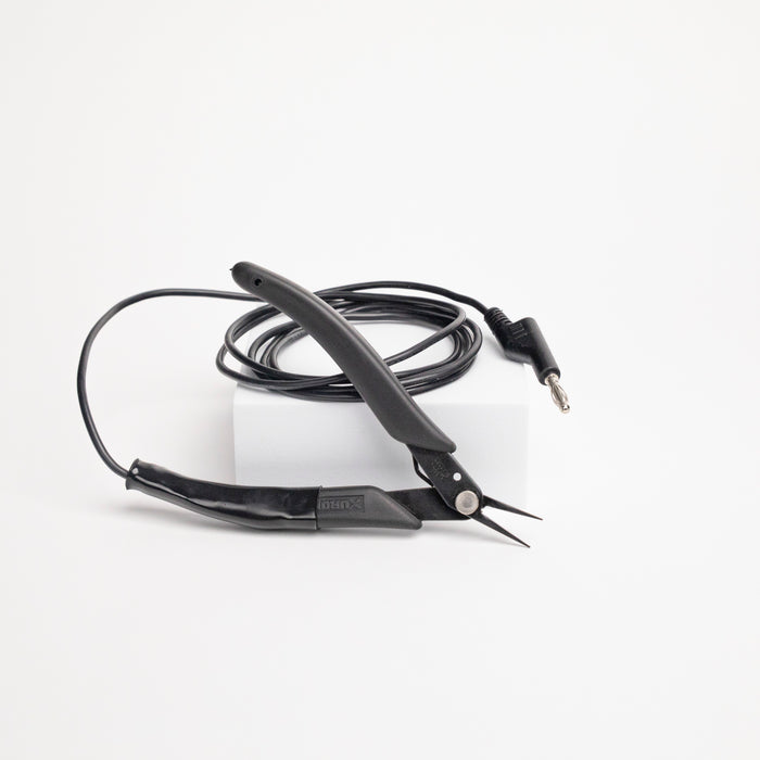 Black pliers with a coiled cable for grounding when welding on a white background