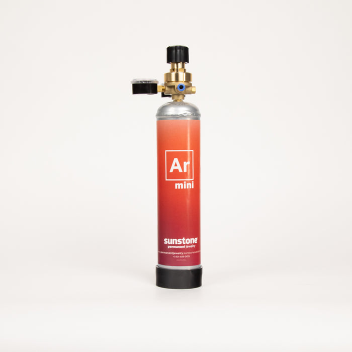 Sunstone Argon mini gas canister with a regulator on a white background